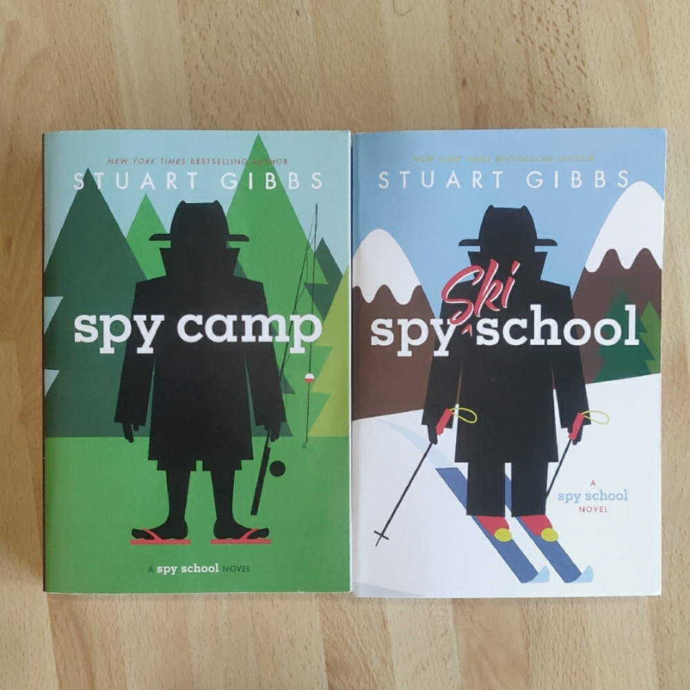 Stuart Gibbs: Spy Camp and Ski Spy School Softcover Books
